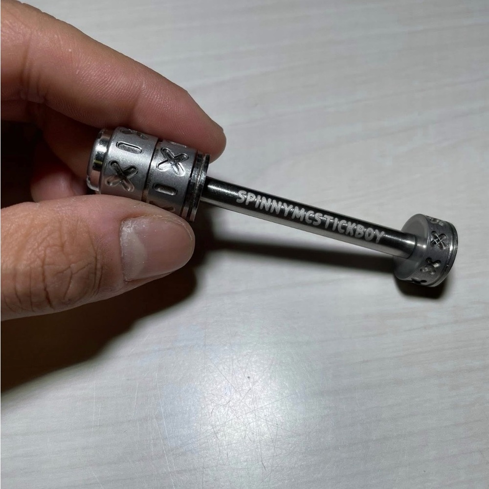Silver Spinny Metal Stick Toy